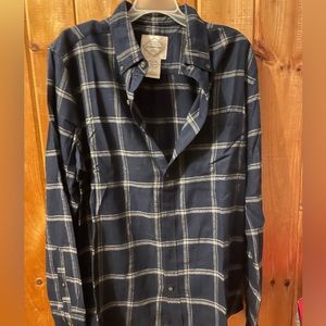 A blue flannel shirt presented by St John’s Bay.